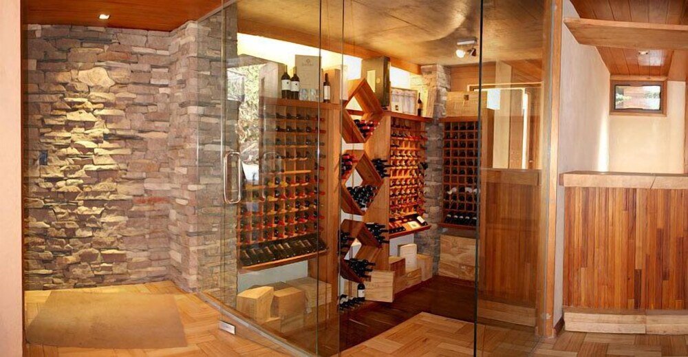 Stone-walled wine cellar area inside the aparthotel complex