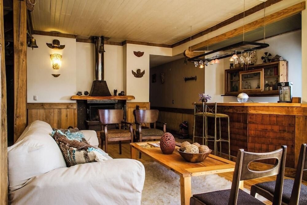Living area with a fireplace in the hotel