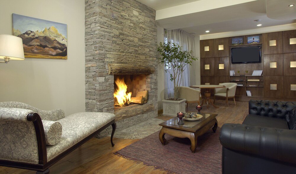 Cosy living room with a stone fireplace