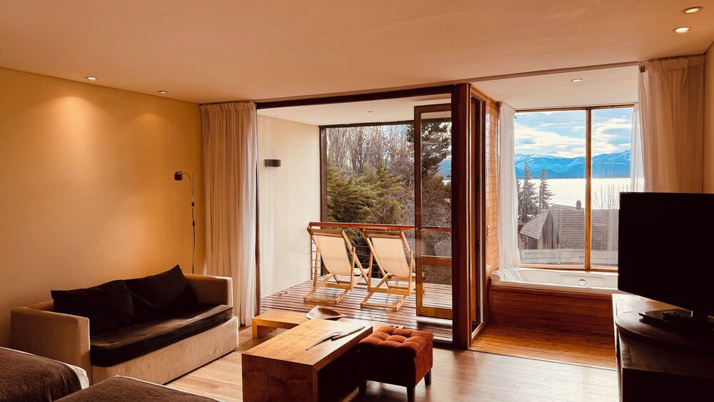 Modern living room with a sofa at Design Suites Bariloche
