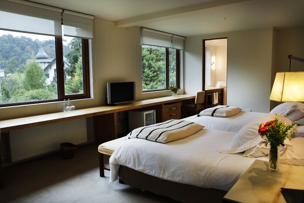 Room view of the surrounding landscape and water