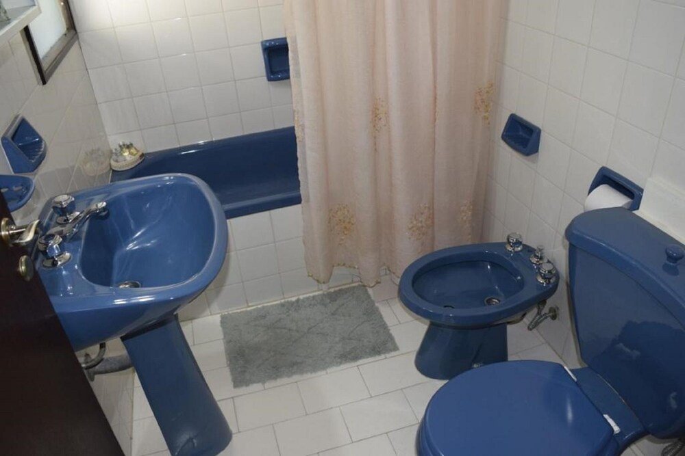 Bathroom at the lodge with a shower and tub