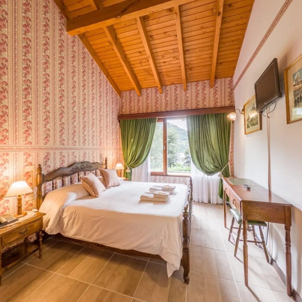 Guest room at Hostería El Condado by Nordic with simple furnishings