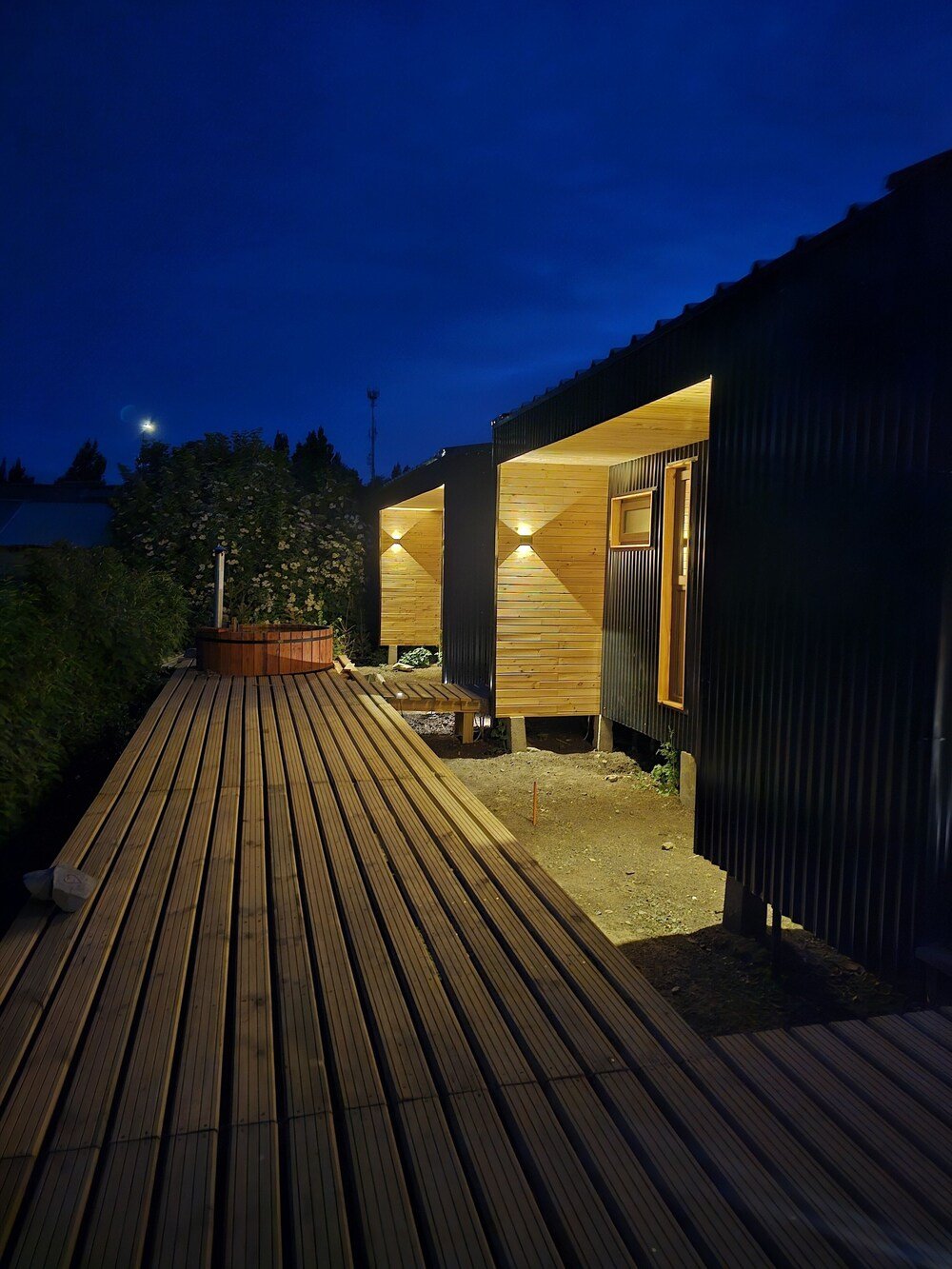 Wooden deck leading to the main building of the hotel