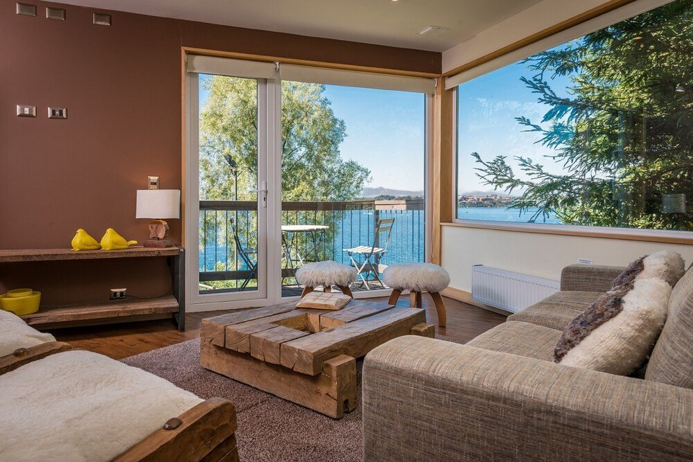 Modern living room with wood details at the hotel