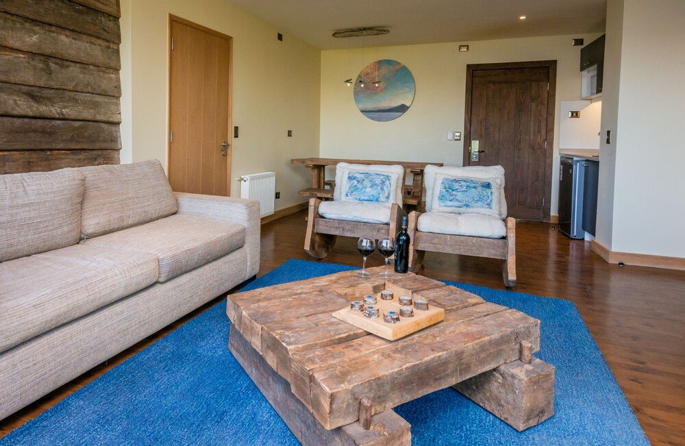 Lounge with a wooden coffee table and seating