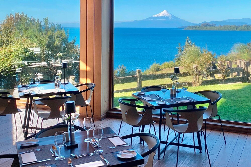 Restaurant dining room with tables set for a meal