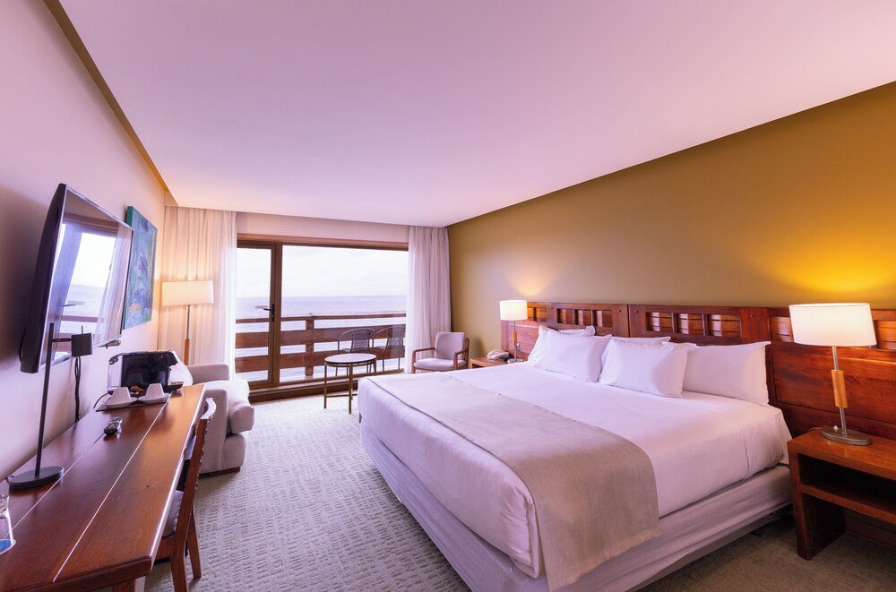 Hotel room with a bed and a work desk