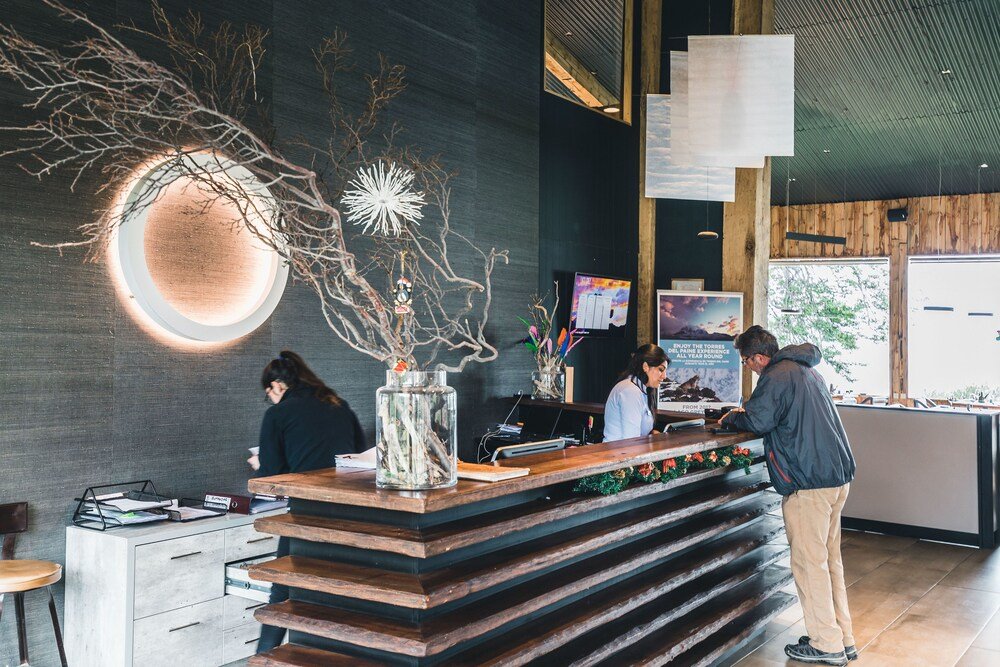 Modern reception desk with a wooden counter