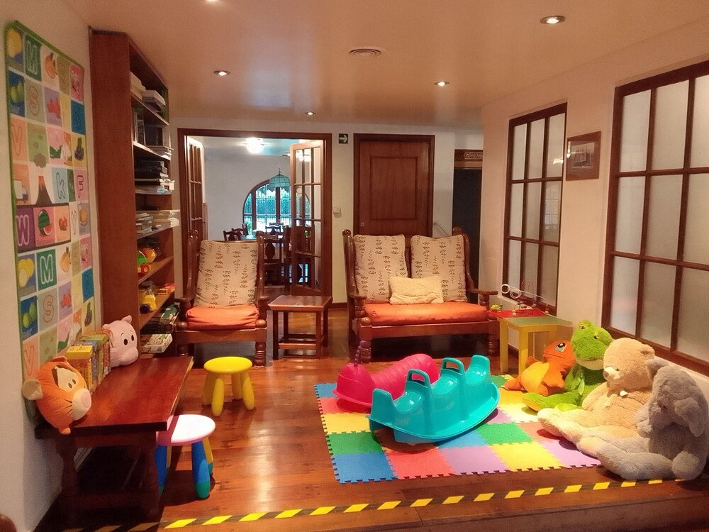 Cosy living room with a wooden floor in the hotel