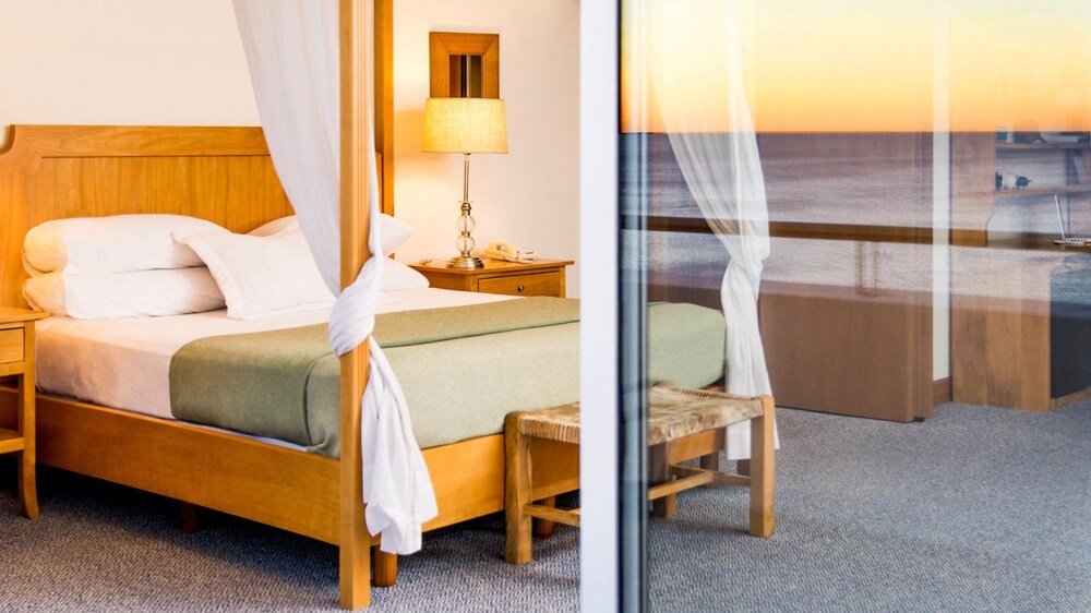 Hotel room with a double bed and a nightstand