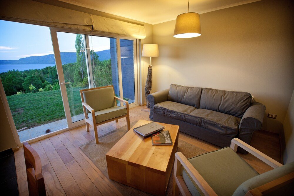 Living room with seating area at Lake Lodge