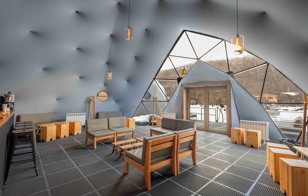 Cosy interior with a geometric ceiling and wood