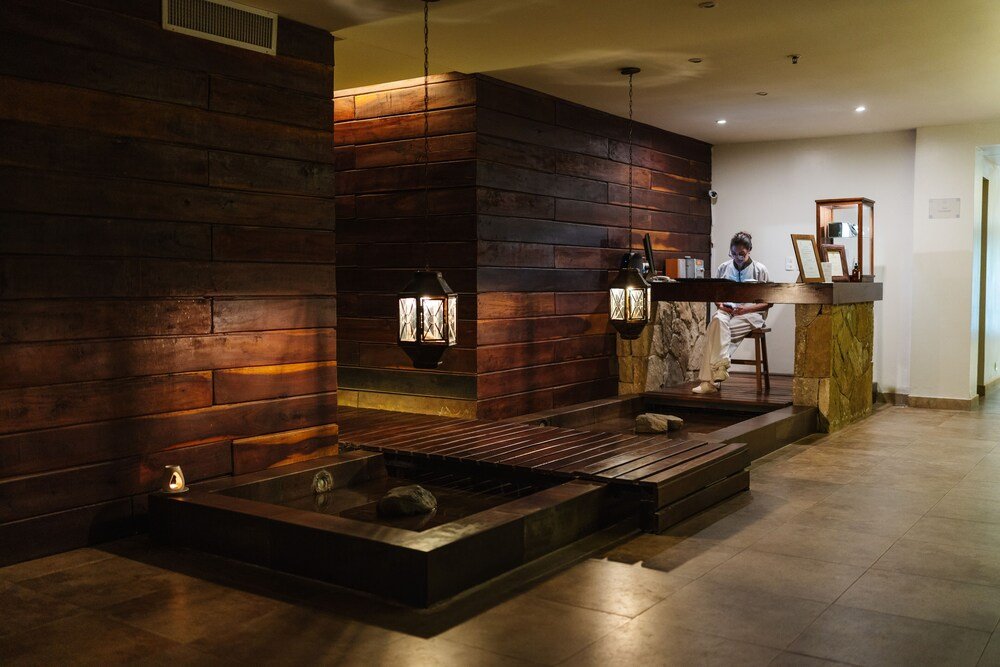 Modern interior with a wooden wall in a hotel suite