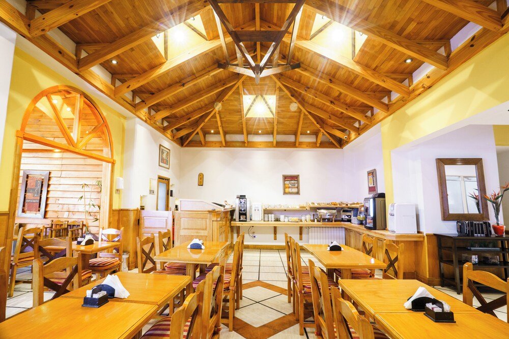 Spacious dining area with wooden tables
