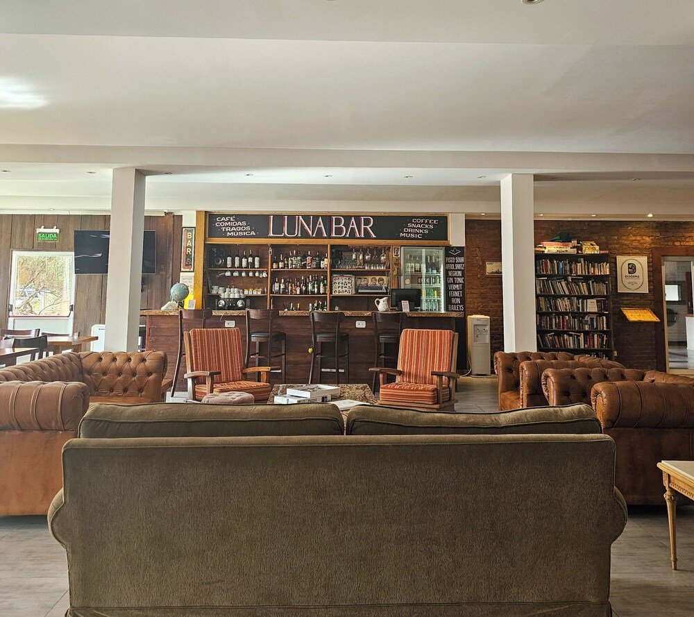 Lounge area with leather sofas and a bar