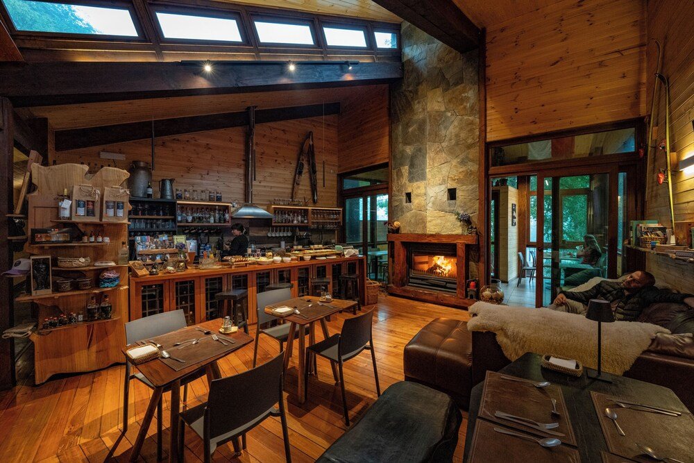 Cozy cabin interior with a dining area at Ni-Newen lodge