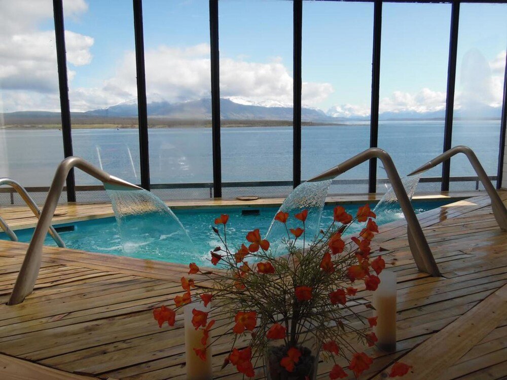 Wooden deck with the indoor pool at Noi Indigo Patagonia