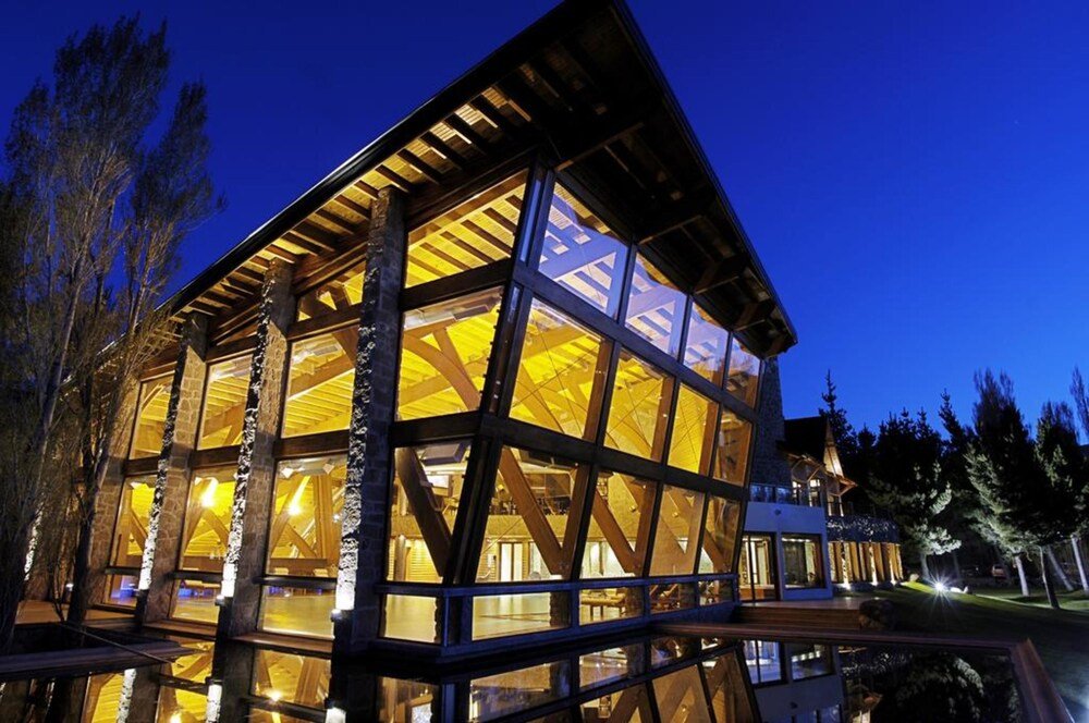 Modern building with large windows and wooden details