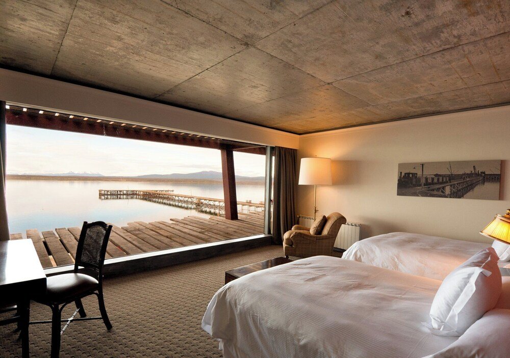 Hotel room with a large window at The Singular Patagonia