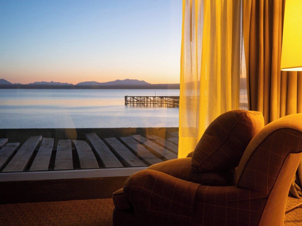 Room with a view of the calm water at The Singular Patagonia